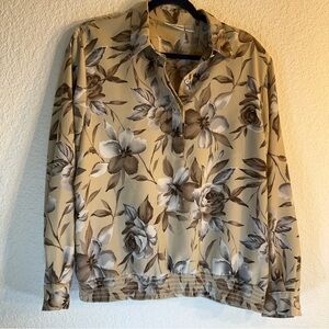 Alfred Dunmer Women’s floral print blouse with a smocked elastic‎ hem. Size 16